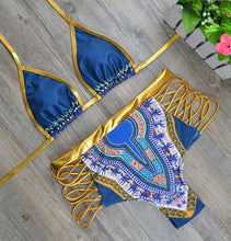 Cargar la imagen en el visor de la galeríaNuevo conjunto de bikini de dos piezas con estampado africano 2025, traje de cintura alta dorado
